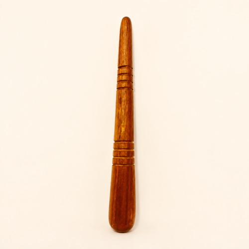 Teak wood foot massage stick with rounded ends and carved grip rings on a plain ivory background