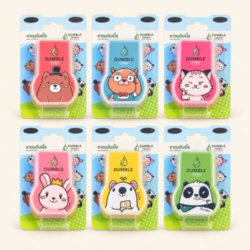 Six Dumble animal-design double-hole herbal inhalers in their retail packs on a warm cream background