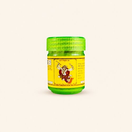 Hanuman Thai herbal inhaler 5 g jar on a warm cream background